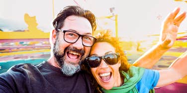 Couple making their relationship exciting, boosting dopamine on roller coaster