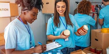 Food bank workers sorting food