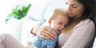 mom consoling toddler tantrum