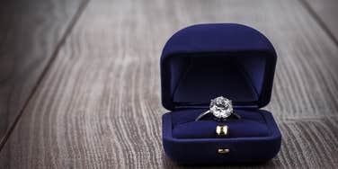 engagement ring in box on table
