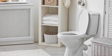 clean white bathroom with toilet