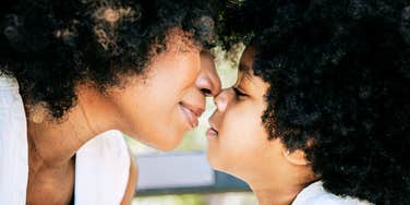 Mother embracing child, during and after divorce 