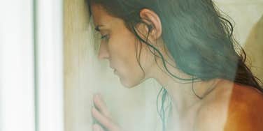 Woman in shower after giving consent but getting bruises in return