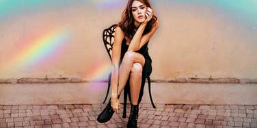 Single Woman sitting in lone chair 