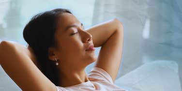 Woman is peaceful knowing she finally knows how to kick insecurity out of relationships.
