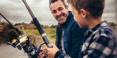 Man being present in his sobriety, fishing with his son on fathers day