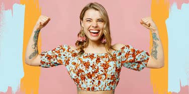 Woman flexing with a lot of joy after being trapped by sadness