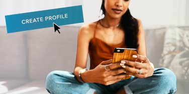 Woman creating online dating profile