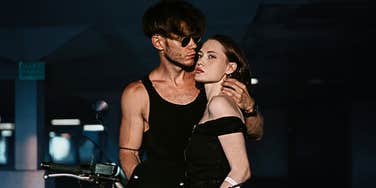 Couple that probably won't last in a garage in dark clothing