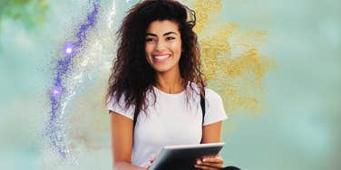 Smiling Black woman with sparkling energy around her 