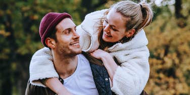 Man displays body language that reveals to his partner he loves her.