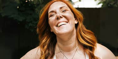 Woman smiling full of happiness