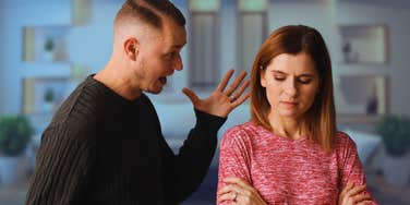 Man shows the signs that he is toxic and controlling to a woman.