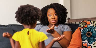 Mother redirecting child with other options