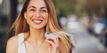 Woman is happy she knows the cheat codes that give her an unfair advantage in her relationship.