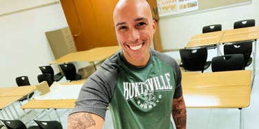 Author taking a selfie of himself during his first year teaching.