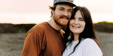 Couple smiling together.