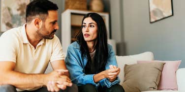 Couple going through a divorce, cordially talking. 