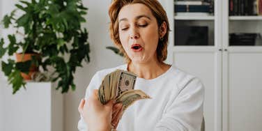 Woman's mother passed away years ago and still gives her money.