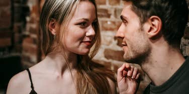 Woman knows the secret word to make a man commit instantly.