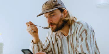 Man realizes while eating a snack that it could increase cancer risk.