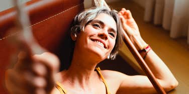 Euphoric woman calming her anxious mind by asking herself simple questions. 