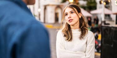 Annoyed woman running into ex wanting to come back.