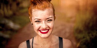 Woman who is ahead in life, smiling.