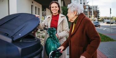 Woman talking with her retired neighbor.