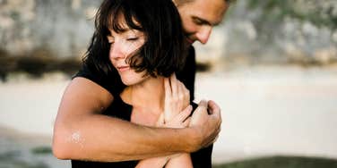 A tender moment between a couple in love, intimate connection.