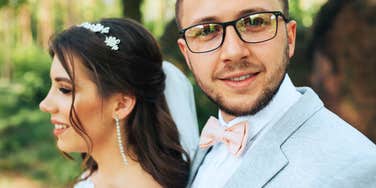 Man on his wedding day making his vows to his wife. 