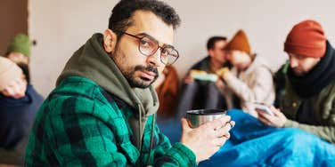 Man volunteering at homeless shelter