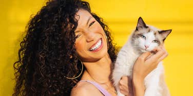 Woman is pretending to be happy in a relationship.