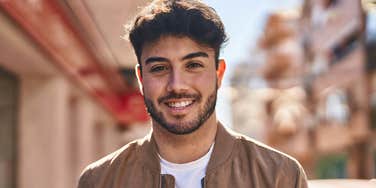smiling happy man with a good life