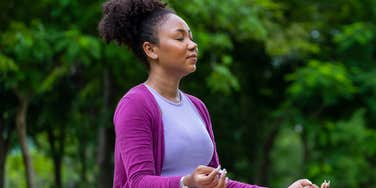 Woman masters mindfulness skills to become a zen master.
