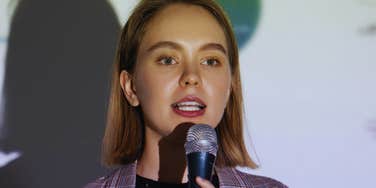 Woman knows phrases of a natural born leader.