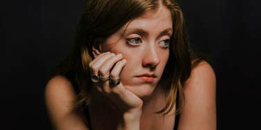 Woman dealing with severe emotional abuse. 