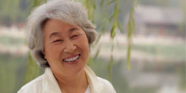 Older woman masters skills to remain happy.