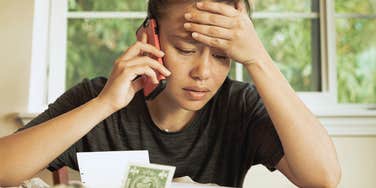 woman stressed about being broke having no money