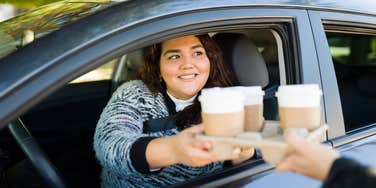 woman picking up her order at Starbucks realized a tip was added without her approval