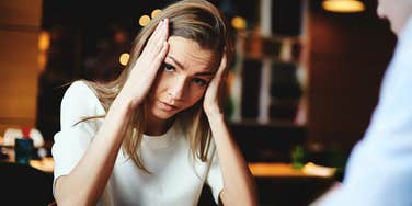 Woman with a partner who exhibits extremely poisonous behaviors. 