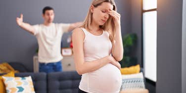 Pregnant woman annoyed with her husband's childish behavior