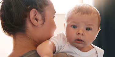 Woman with baby wonders why she hates being a mother