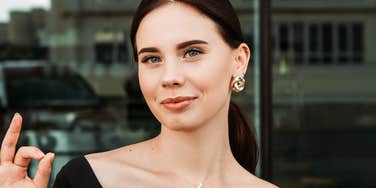 brilliant woman with brown hair does admirable things to make liars hate her