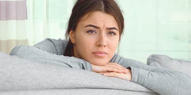 Young woman is sad because she's closed off to magic 