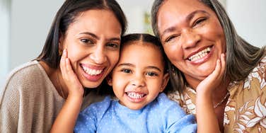 Millennial parent with her daughter, and Boomer mother. 