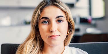Woman feeling iffy, like she is about to be ghosted.