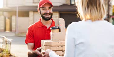 woman getting food delivery
