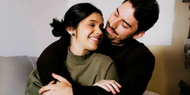 Man proving to woman with low effort that she's the best thing to ever happen to him.