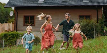 Happy family with the perfect number of people living in their home